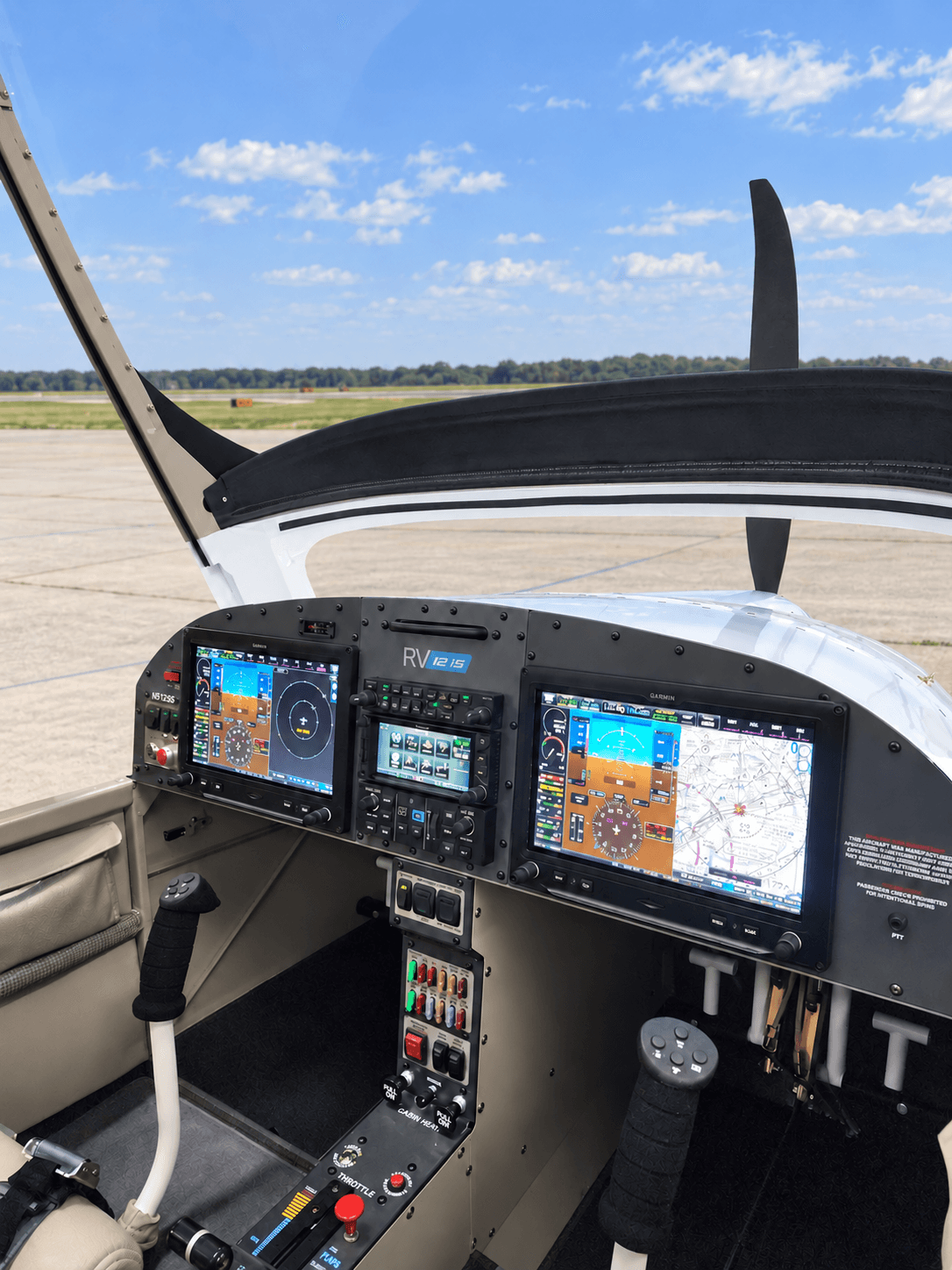 Falcon RV-12iS cockpit on the ramp with Garmin G3X Touch displays, center GPS, and autopilot controls
